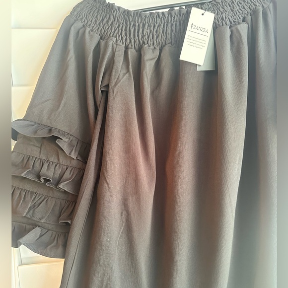 ⭐️NWT Black off the shoulder dress with ruffle sleeves and hem - Picture 6 of 8